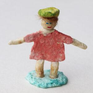 Kaksipuolinen Uusi päivä patsas