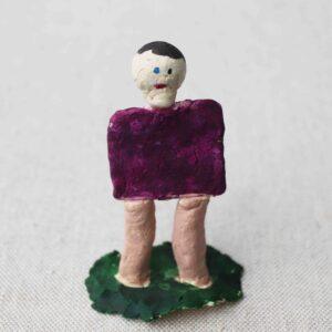 Kaksipuolinen Mitä mietin patsas